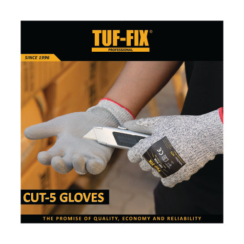 TUF-FIX CUT-5 gloves being used with a tool on a blurred background